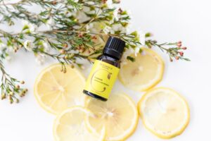 lemon oil with lemon fruit slices