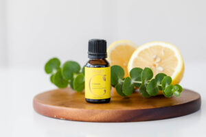 Lemon Oil and lemon fruit and leaves