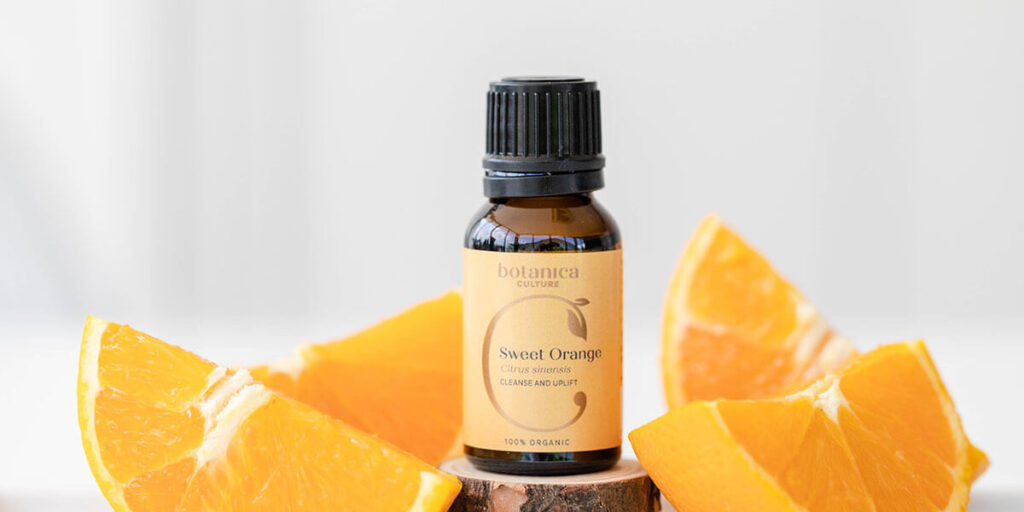 sweet orange oil with oranges for relaxation